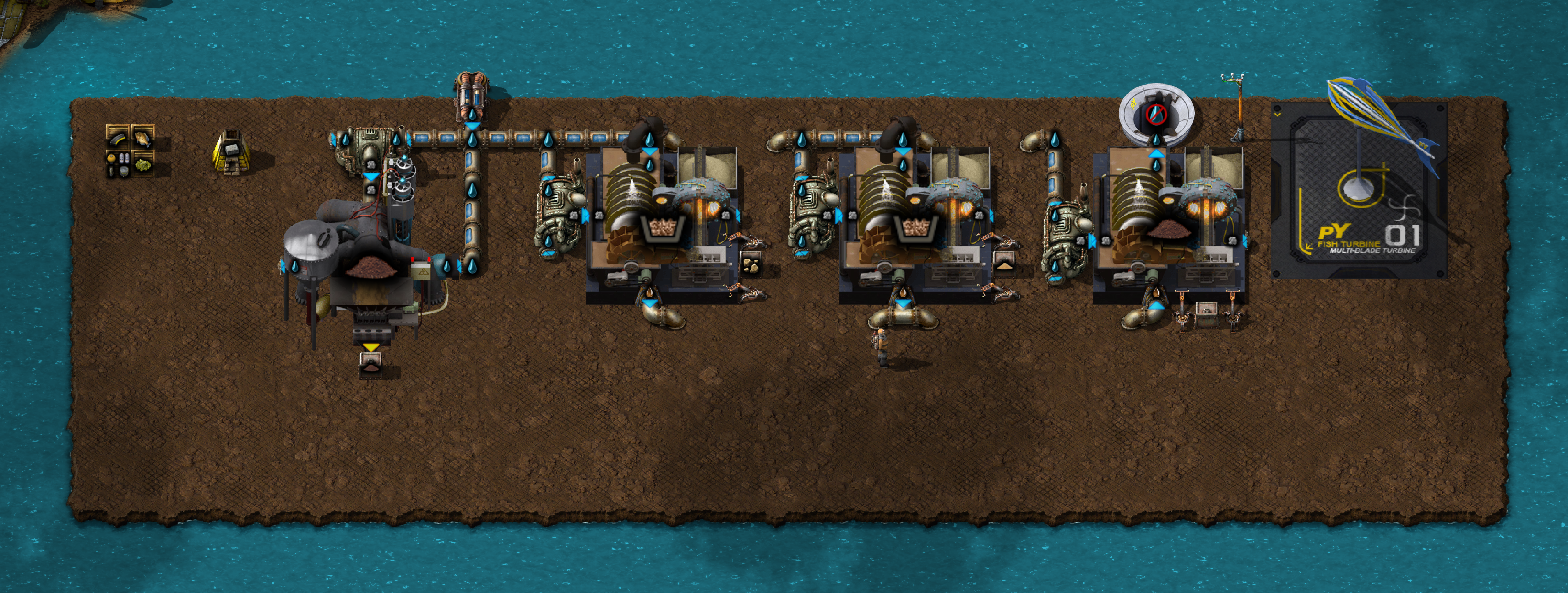 The resulting platform: a horizontal line of machines set up on landfill, with some storage at the left.